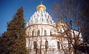 Blue skies, white temple and gold cupolas